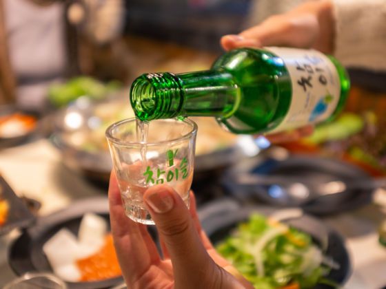 Pouring-Soju,drinking-culture-in-korea,soju-drink,what-is-soju-made-of